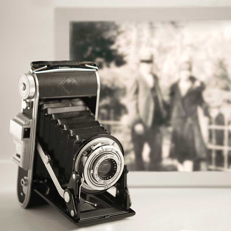 Old camera and photo